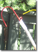 THREAD THE ROPE THROUGH THE HOOK