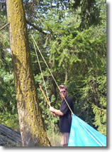 PULL ON THE ROPE TO RAISE THE TARP 